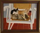Gatos sobre una silla